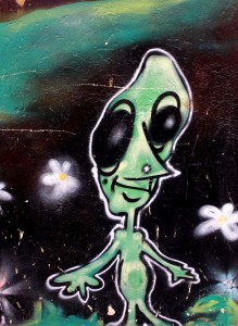 alien with flowers