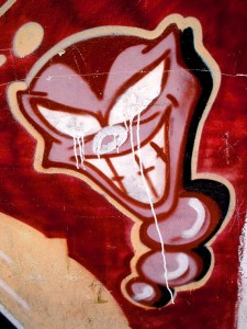 graffiti of a creepy red devil 